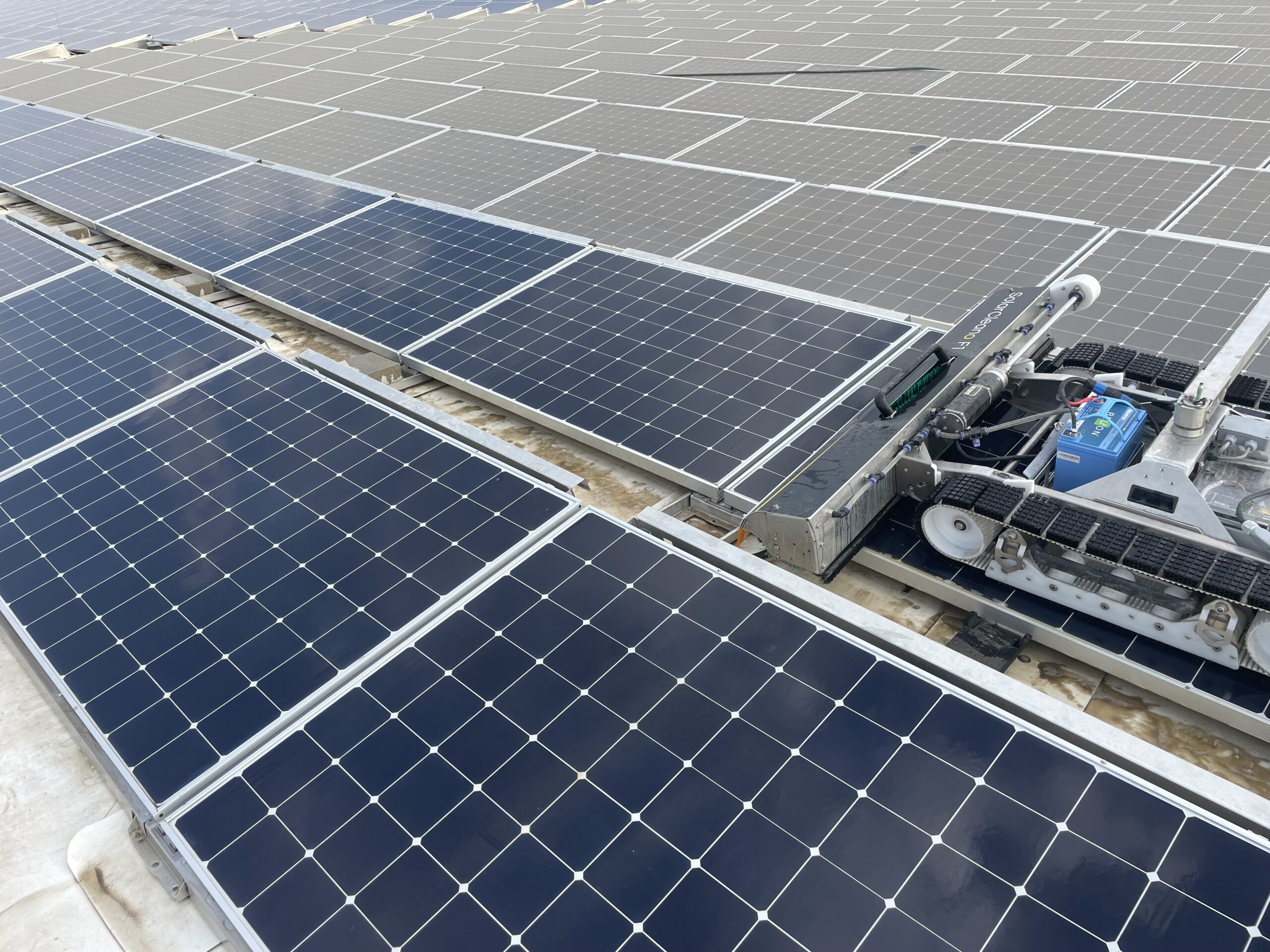 A solar panel cleaning robot on solar panels