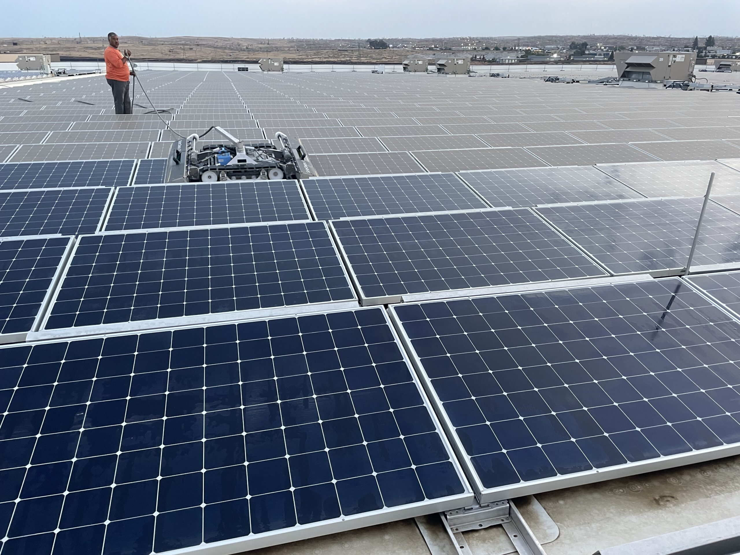 Solar panel cleaning robot on solar panels