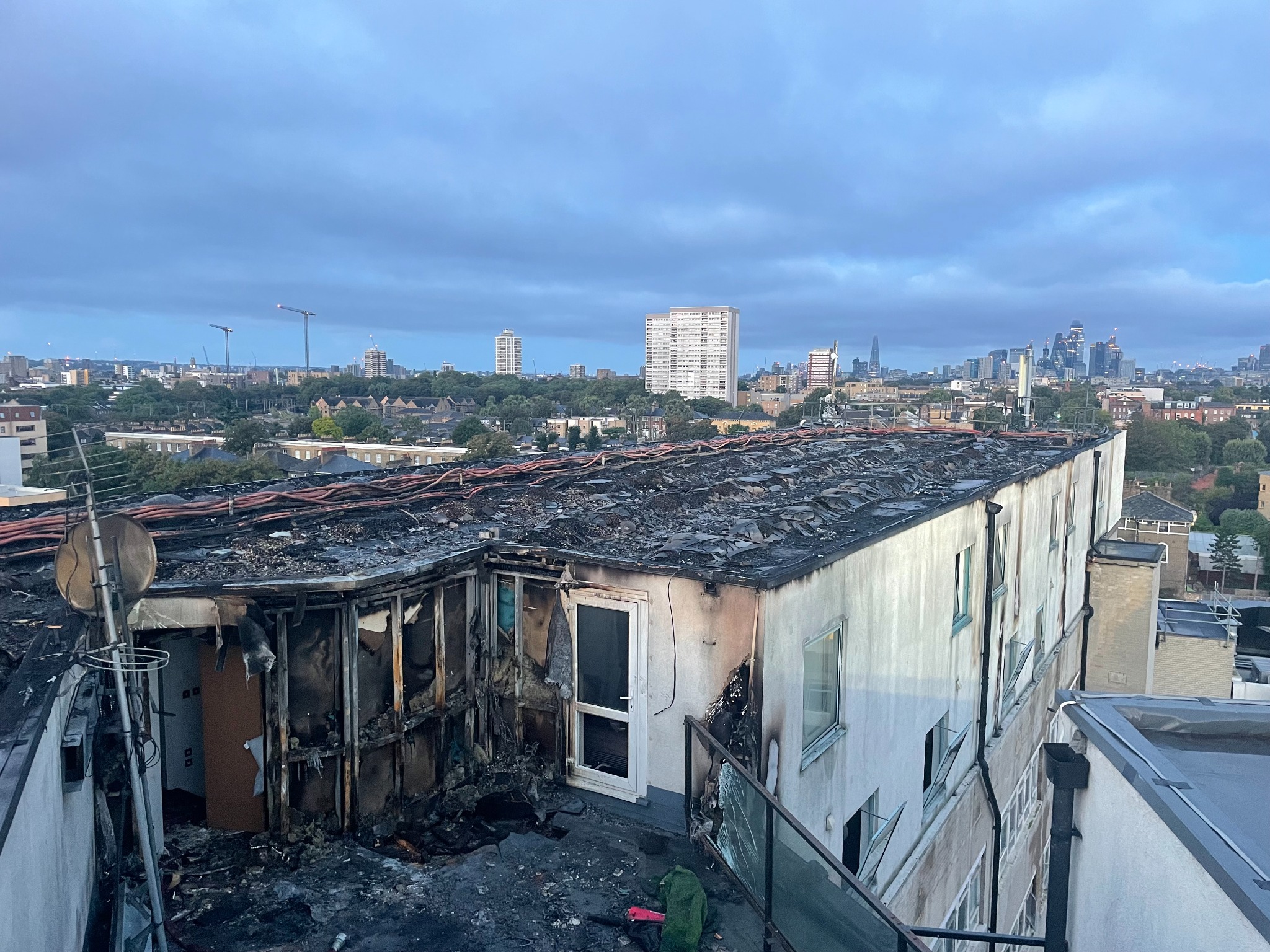 Extensive rooftop and building damage documented during a photovoltaic fire investigation
