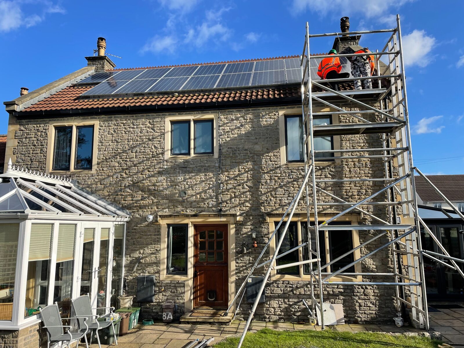 Mobile scaffold tower used to provide controlled access to a residential solar array